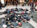 Extinction Rebellion Youth stage die-in at Manchester Arndale